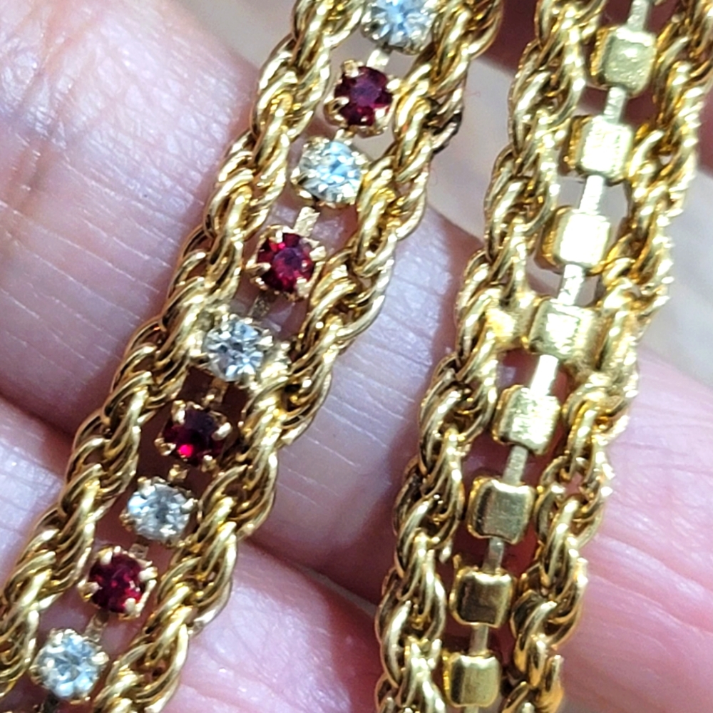 Beautiful Red and white crystal with gold tone tennis bracelet.